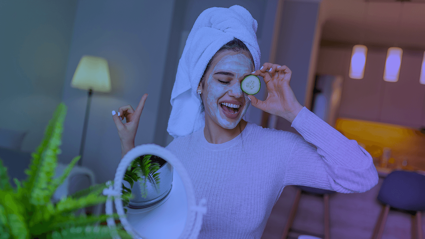 A woman with mask on the face and towel on the head